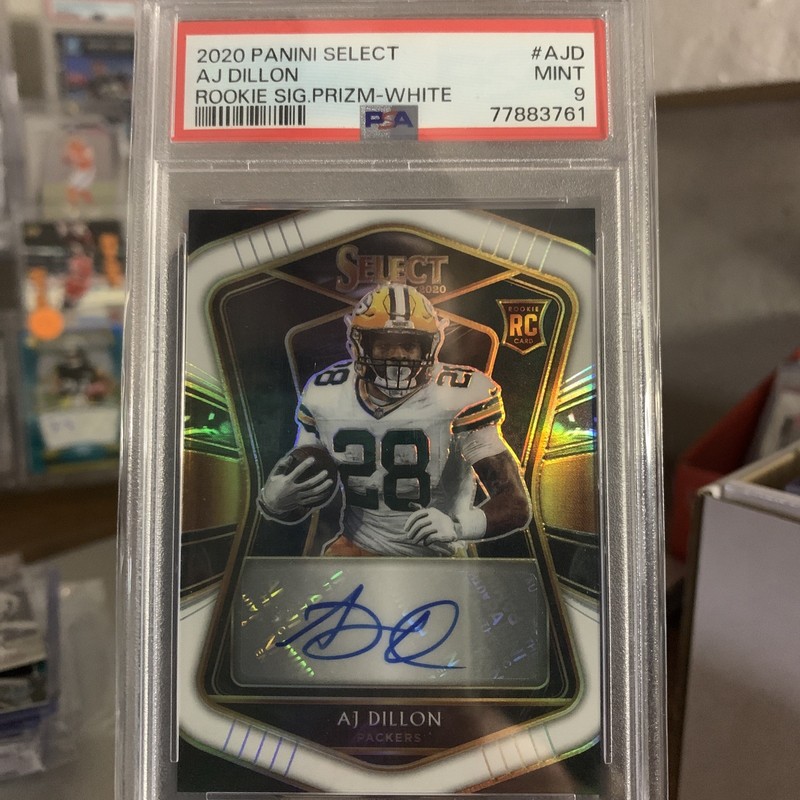 2020 Panini Select AJ Dillon rookie Select Signatures Prizm White Auto/35. Psa 8