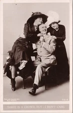 VINTAGE 191O RPPC HUMOR ROMANCE POSTCARD-THREE IA CROWD, BUT I DON'T CARE