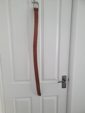 Hugo Boss mens tan leather belt in fair used condition