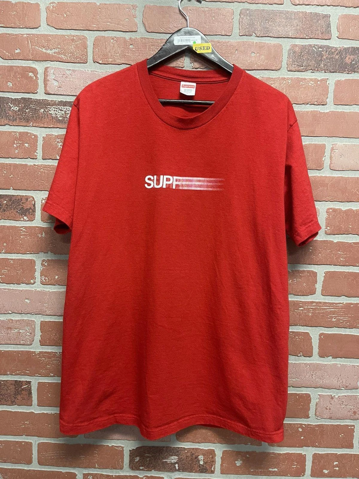 Taille L   Tee shirt rouge Supreme Motion utilisé en douceur