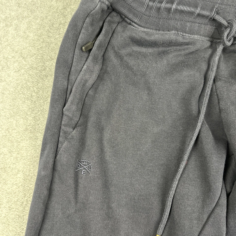 Pantalones de chándal Jordan Craig Uptown para hombre L azules edición Legacy bolsillo elástico Foto 2 de 4