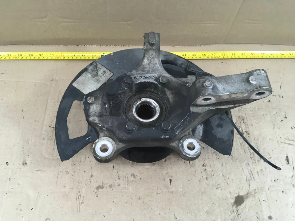 Dodge Grand Caravan 2017 buje de cojinete de rueda delantera izquierda 04743579AB KAD13508 OEM. Foto 3 de 4