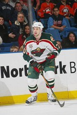 Defenseman Andrei Zyuzin Minnesota Wild looks on v the New Y- Ice Hockey Photo