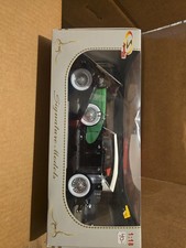 Signature Models Limited 1:18 1934 Duesenberg Diecast Car Silver/Green/White