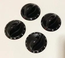 Set of 4 black Jenn-Air burner control knobs 74005706 74005708 stove range