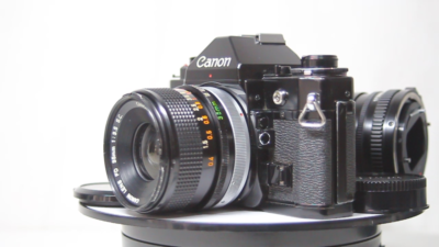 Canon A-1 SLR Film Camera Black + FD 35mm F/3.5 S.C + NFD 100