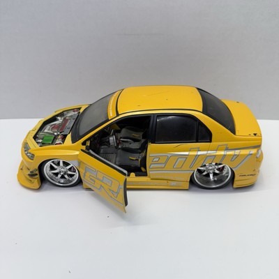 1:18 JADA Mitsubishi Lancer Evolution VIII GReddy Yellow IMPORT