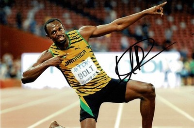 Olympiasieger Usain Bolt signiert 12x8 Blitz Pose Foto + Händler Echtheitszertifikat