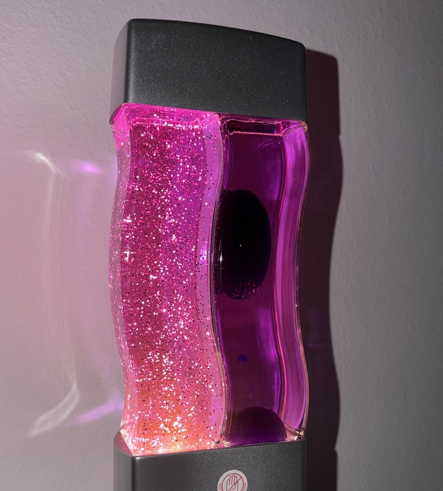 Dual wavy lava lamp in dreamy pink and purple glitter — the most Y2K-coded piece of room decor you can buy right now.