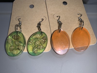 Handmade Resin 2 Pair oval orange the other is a see through green with ...