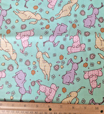 Easter Bunny Toss Pastel Green with Glittery Sparkles Cotton Fabric 26 inches