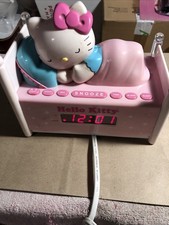 Hello Kitty Sleeping in Bed Alarm Clock Radio Nightlight KT2052P