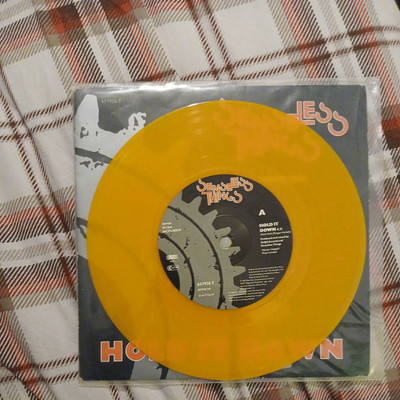 Senseless Things-Hold it down.7'' orange vinyl.