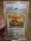 DRAGONITE 1999 POKEMON FOSSIL 1ST EDITION #19/62 PSA 8