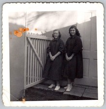 Vtg B&W Snapshot Two Smiling Teenage Girls In Dark Coats & White Shoes 1957