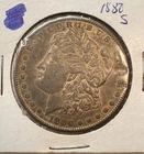 1880-S Morgan $1 90% Silver - cool gold/brass tone