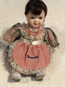 Haunted Paranormal 10" November Birthday Doll -Kelly Positive rocks side to side