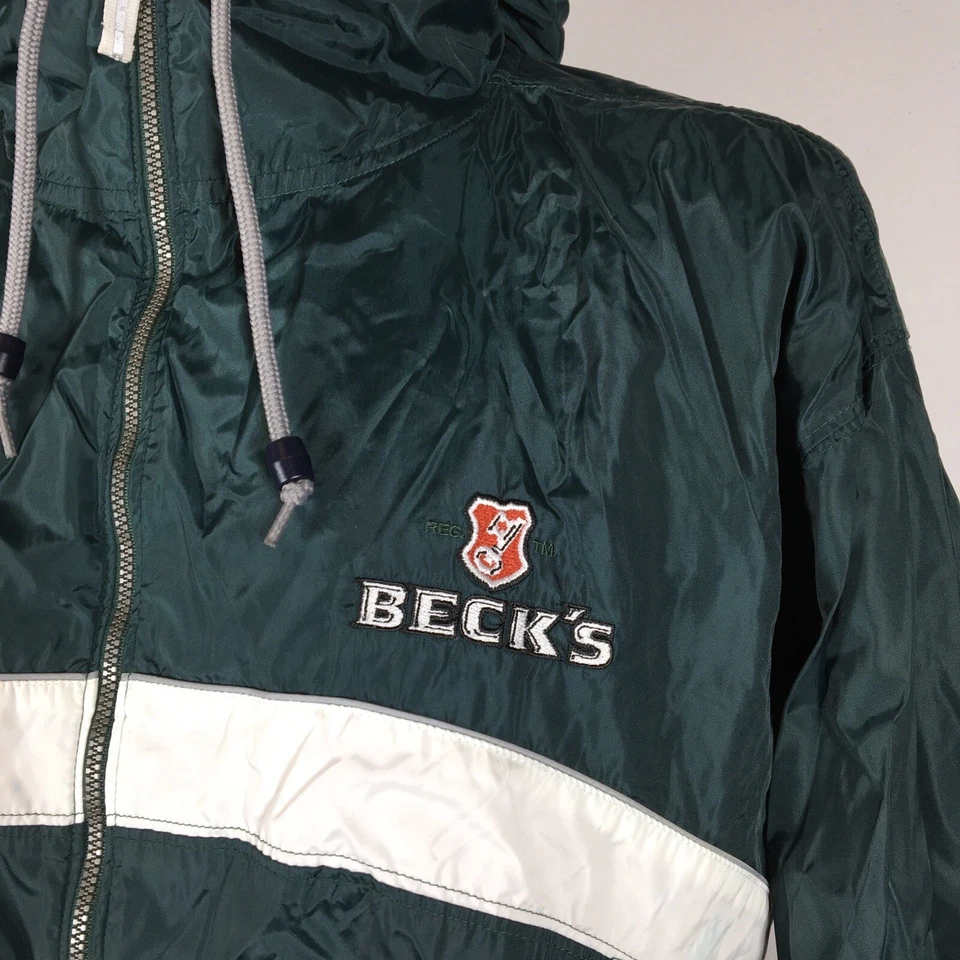 Chaqueta cortavientos Becks Beer verde/blanco forrada de malla cremallera completa con capucha. Hombre S Foto 3 de 4