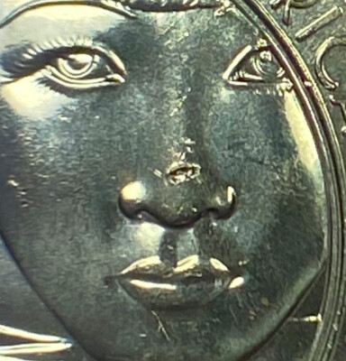 2022 D Anna May Wong quarter error - deep die break (or chip) on Anna's nose.