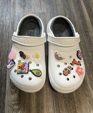 Crocs womens Size 7 Men 5 with Fur Inside and Charms On Them