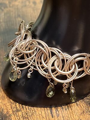 AVON MARK A Little Loopy Bracelet - Gold Finish With Green Stones NIB