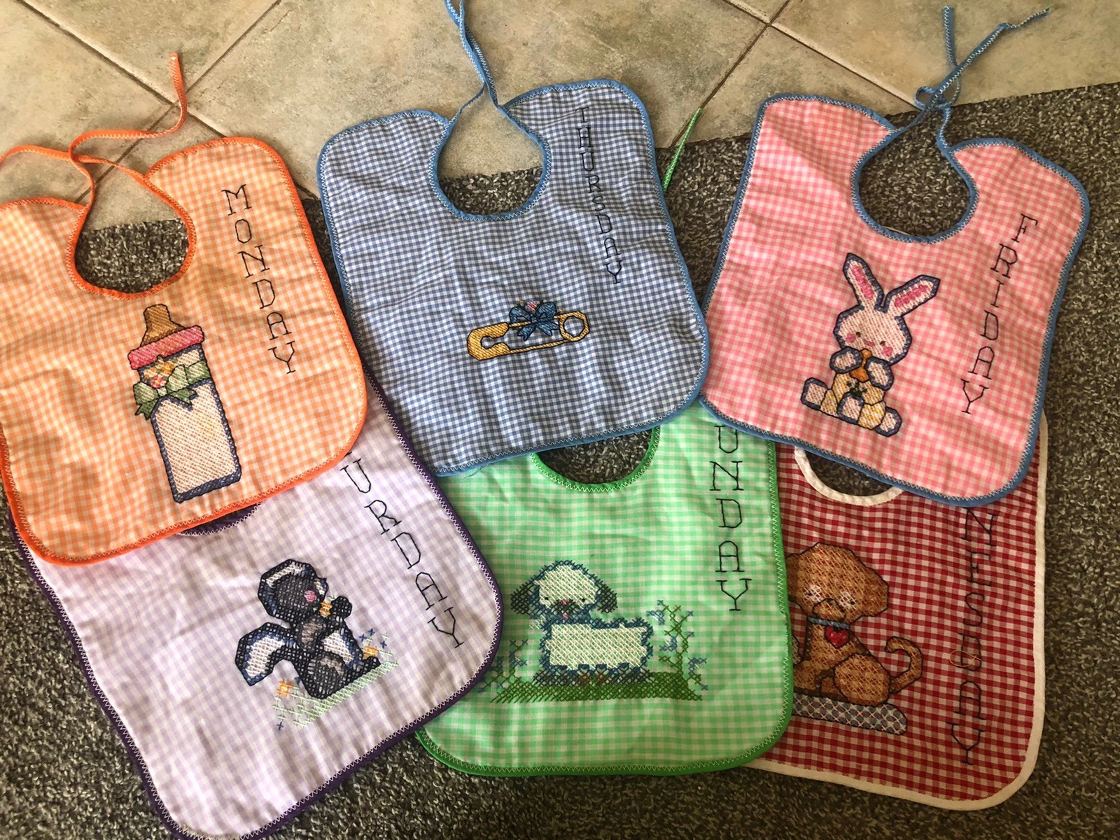 Set of 6 vintage cross-stitched baby bibs. Gingham Days Of The Week
Opens in a new window or tab