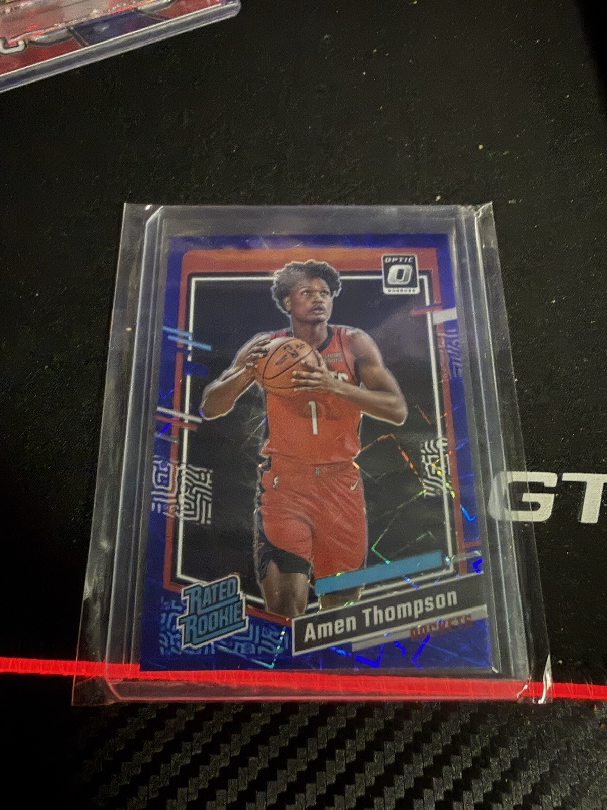2023-24 Panini Donruss Optic Rated Rookie Amen Thompson #229 Blue Velocity Prizm