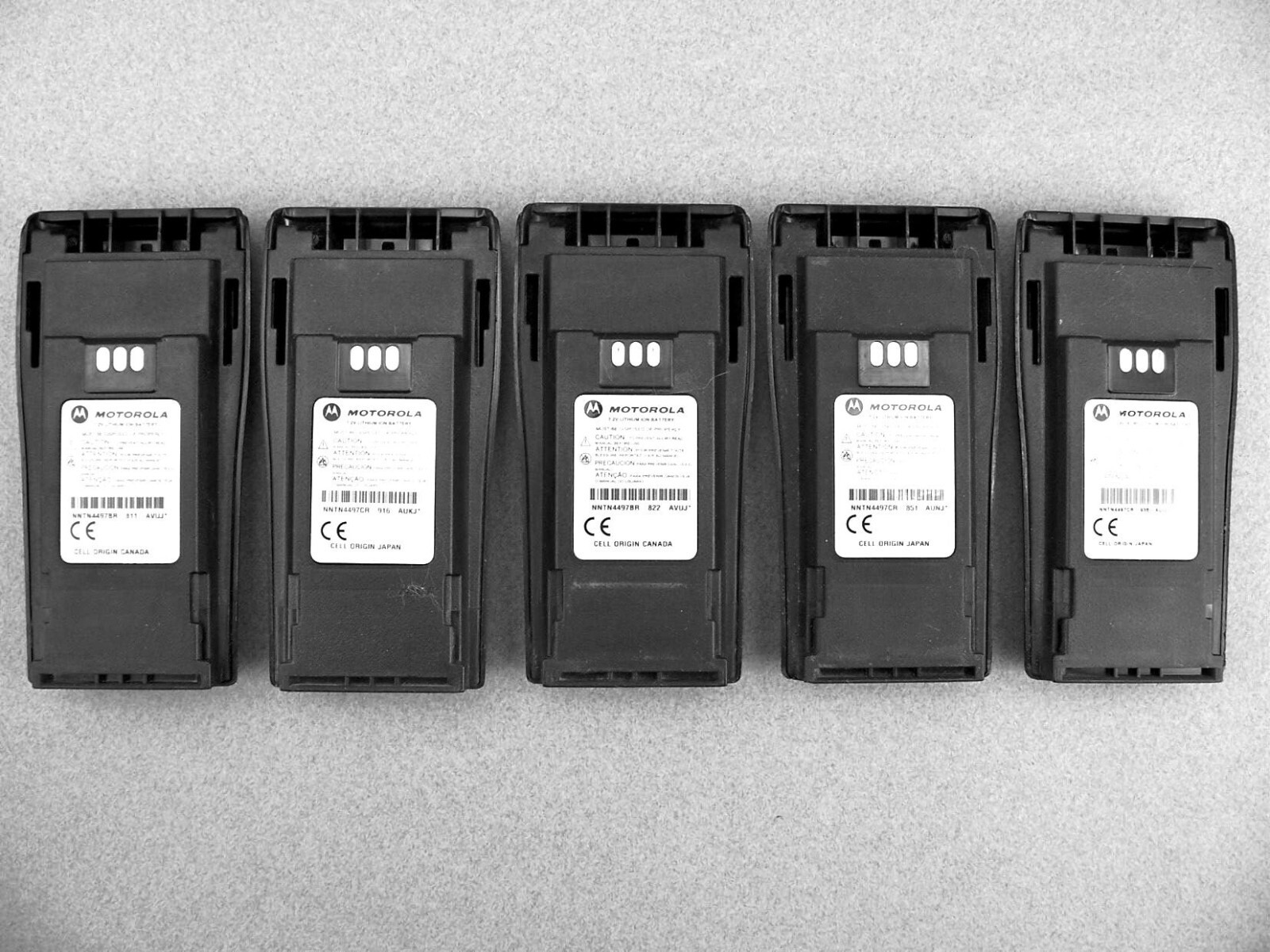 Set of Five Used NNTN4497DR/CR Li-Ion Motorola Radio Batteries w/Belt Clips