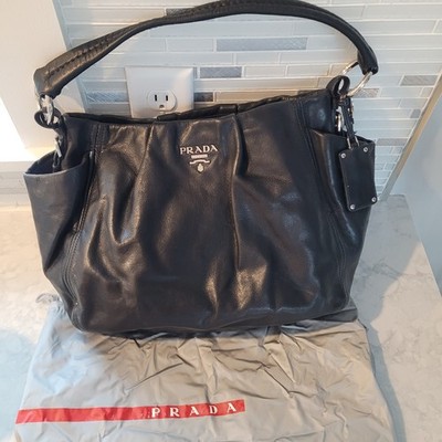 Prada Soft Leather Black Hobo Handbag With Two Side Pockets And Dust Bag