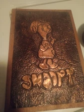 Copper hammered snoopy artwork