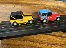 2 BEAUTIFUL VINTAGE TYCO JEEP CJ-7 ‘s BLUE & RED HEADLIGHTS WORK STRONG RUNNING
