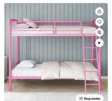 girls pink bunk bed/twin on twin Never opened still in box.