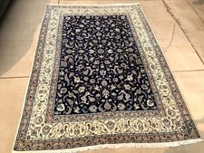 Handwoven middle eastern rug fish shaped flower pattern. T A B R I Z