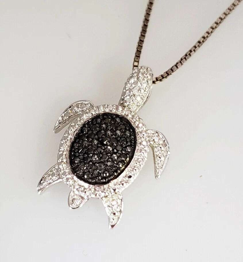 Black diamond turtle necklace deals