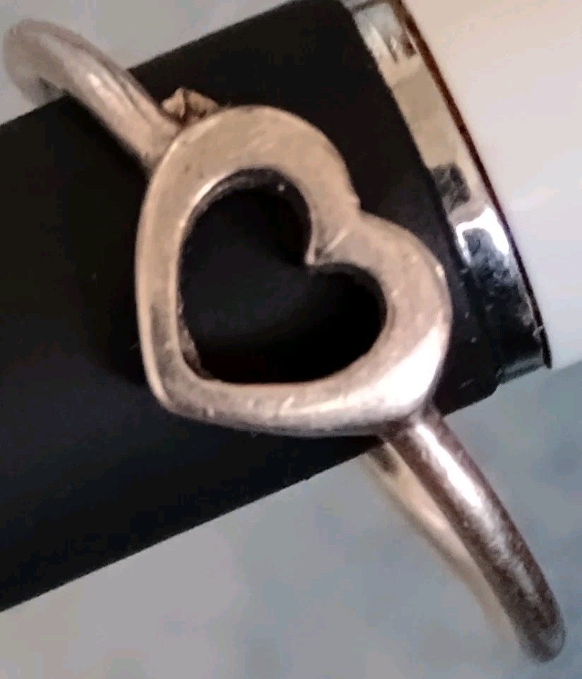 .925sterling Silver Heart Ring Size 4 Slight Bend .74 Grams