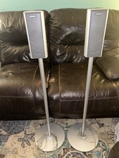 Sony SS-TS52 silver tower speakers featuring a black mesh grille and metal stand