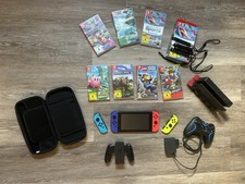 Nintendo Switch 1 Konsole mit Docking, 4 Controller, 7 Spiele viel Zubehör