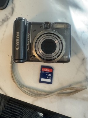 Canon PowerShot A590 IS 8.0 MP Digital Camera Works Well w/Strap & 4GB SD Card