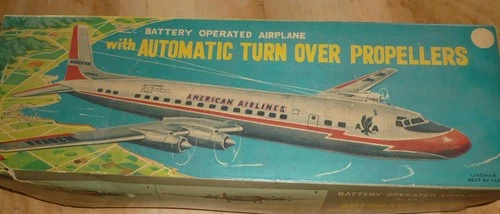 AMERICAN AIRLINES DC-7-C BATTERY OP WITH TURNING PROPS MADE BY MARX