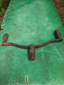 ANTIQUE HANDLE FOR TRACTORS OR WATER  VALVE??? OR ECT DON'T KNOW WHAT IT IS FOR.