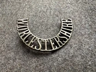 Genuine WW1 period Worcestershire Regiment brass shoulder title