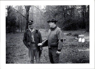 Boy Scout Leaders in Wooded Camp Clearing w/ Campaign Hat 1950s Photograph
