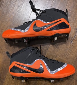 orange metal baseball cleats