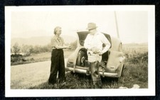 Vintage Photo MAN PUTS ON WADERS FOR TROUT FISHING @ STILLAGUAMISH RIVER 1946