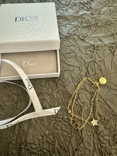 Bracciale doppio CD Christian Dior metallo finitura oro e cristalli bianchi