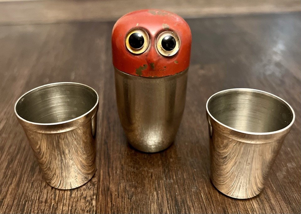 A pair of 1960s German owl-shaped shot glasses — quirky collectible barware with genuine vintage character.