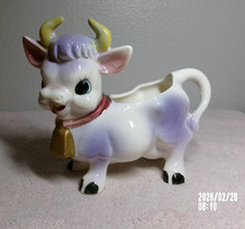 ROSSINI LABEL JAPAN PURPLE AND WHITE COW CREAMER 4 5/8" TALL 5" LONG 2 1/4" W