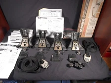 Set Of 4  Yakima Q Towers For Round Bars with Q124 clips, straps, caps and docs.