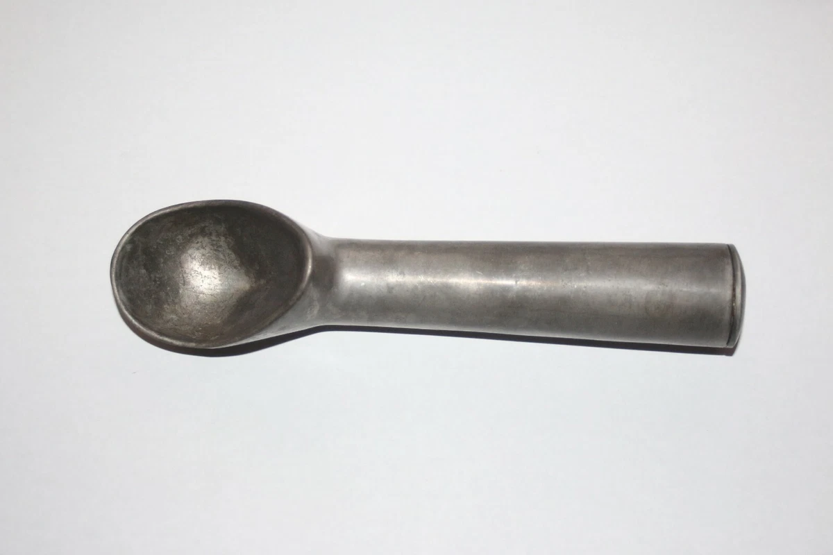 Vintage Cast Aluminum ICE CREAM SCOOP fluid in handle. Old fashioned