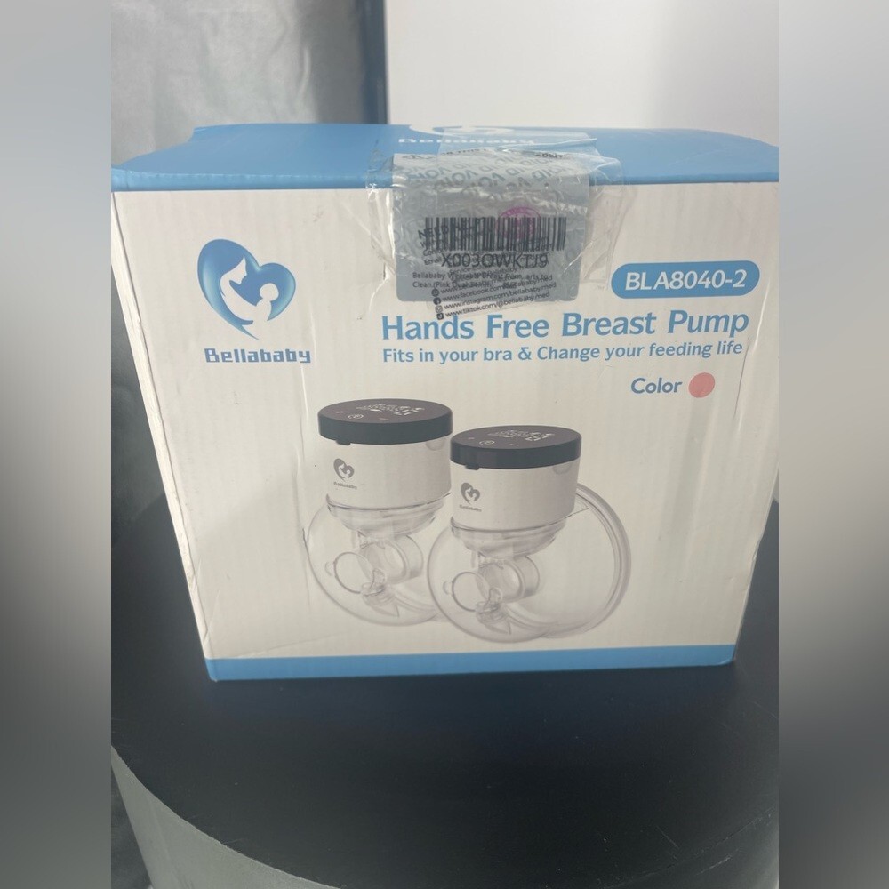 Brand new Bella baby handsfree breast pump color pink